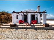 Casa con terreno en venta en Coín