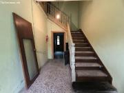 Casa con terreno y local comercial en el centro de Lada...