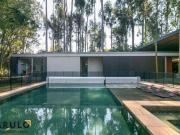 Casa contemporânea com 6 suítes à venda, 850 m² por R$...