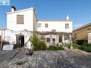 CASA CORTIJO CON PARCELA RÚSTICA DE RIEGO