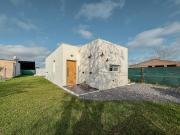 Casa de 2 dormitorios con jardín y pileta en Tierra de...