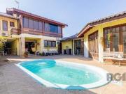 Casa de 4 dormitórios 304m² no bairro Jardim Lindóia