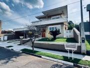 Casa de Alto Padrão à Venda – 6 Suítes no Condomínio...