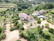 Casa de campo em pedra com terreno e poço em Serrada, em...