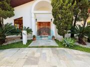 Casa de Condominio Alphaville com 4 suítes com piscina...