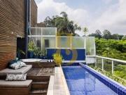 Casa de condomínio com 353 m², 4 quartos sendo 4 suítes...