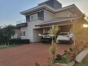 Casa de condomínio com 3 suítes à venda, 400 m² por R$...