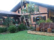 Casa de condomínio com 4 quartos à venda, 285 m²