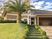 Casa de condomínio com 4 quartos à venda, 414 m²