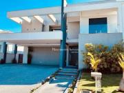 Casa de condomínio com 4 suítes à venda, 470 m² por R$...