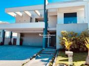 Casa de condomínio com 4 suítes à venda, 470 m² por R$...