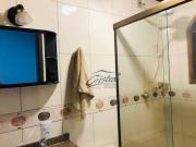 Casa de Condomínio com três quartos