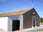 Casa de piedra integrada en el pueblo