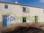 Casa de piedra para restaurar con terreno