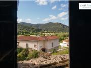 Casa de pueblo con estructura reformada