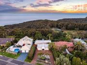 Architectural sanctuary perched above Dudley Beach, only...
