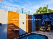 Casa de vila em condomínio no Guarujá na praia da Enseada