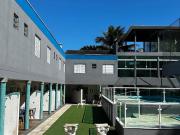 Casa dentro de condomínio em Boiçucanga em uma travessa...