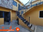 Casa dividida en 3 departamentos, a media calle de Av....