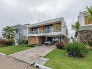 Casa em Condomínio, 4 dormitórios, 383 m², em Bairro...