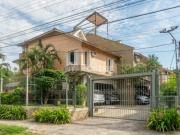 Casa em Condomínio com 3 dormitórios em Porto Alegre