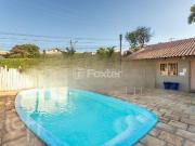 Casa em Condomínio com 3 dormitórios em Porto Alegre