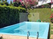 Casa em condomínio com 4 dormitórios, área gourmet e...