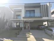 Casa em Condomínio com 4 dormitórios em Canoas