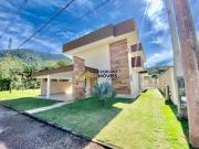 Casa em condomínio com 4 suítes, piscina e sauna na...