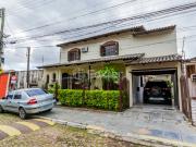 Casa em Condomínio com 5 dormitórios em Porto Alegre