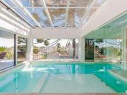 Casa em condomínio com 632 m² privativos e 4 suítes, à...