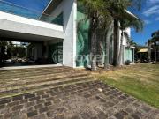 Casa em Condomínio com 6 dormitórios em Xangri Lá