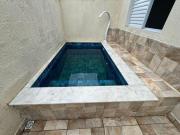 Casa em condomínio com piscina e 2 quartos em Itanhaém