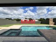 Casa em Condomínio de Alto Padrão com 4 Quartos e 4...