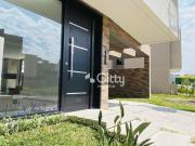 Casa em condomínio fechado com 3 dormitórios, sendo 1...