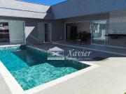 Casa em condomínio fechado com 4 dormitórios, sendo 2...