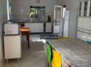 Casa em condomínio fechado de frente para a praia