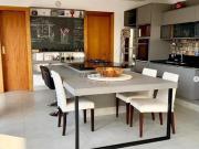 CASA EM CONDOMINIO ITAHYE COM 5 SUITES 4 GARAGENS 436m²
