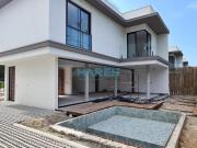 Casa em condomínio no canto do moreira praia de Maresias