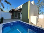 Casa em condomínio nova com piscina e suíte em Itanhaém