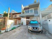 Casa em Porto Alegre, no bairro Hípica, com 3 dormitório...