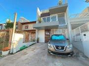 Casa em Porto Alegre, no bairro Hípica, com 3 dormitório...