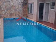 Casa em Rua Affonso Chaves Ocian Praia Grande/SP