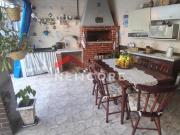 Casa em Rua Augusto dos Anjos Solemar Praia Grande/SP