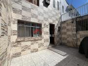 Casa em Rua Silva Jardim Vila Mathias Santos/SP