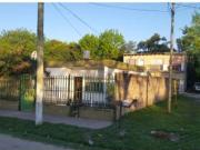 CASA EN BLOCK CON ENTRADA DE AUTOS Y DOS DPTOS. AL CFTE