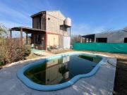 CASA EN COSQUIN CON PILETA A 100 M DE RUTA 38 Y VISTA AL...