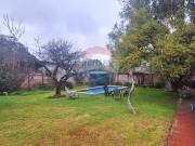 Casa en Las Condes: Piscina y Jardín