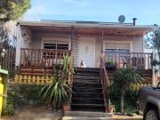 CASA EN LOTE PARQUIZADO