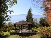 Parcela con amplia vista al lago Villarrica, casa y...